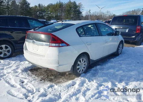 2012 Honda Insight from USA, damaged, VIN JHMZE2H37CS005710